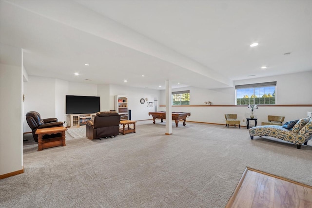 carpeted living room with billiards