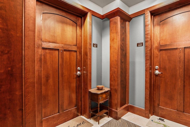 entryway featuring light tile patterned floors