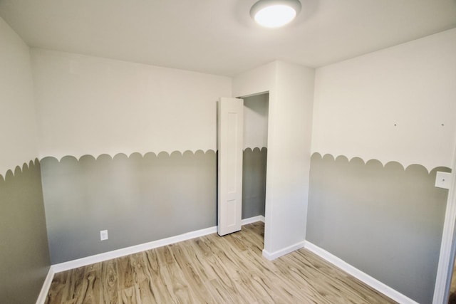 empty room featuring light hardwood / wood-style floors