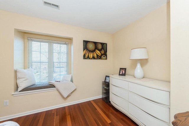 bedroom featuring dark hardwood / wood-style flooring