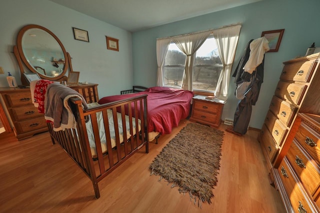 bedroom featuring light hardwood / wood-style floors