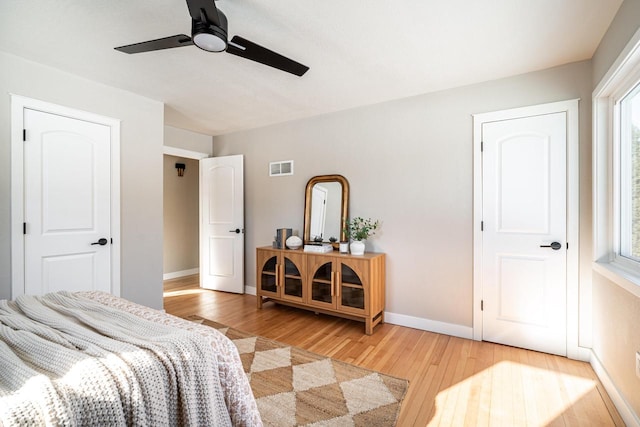 bedroom featuring ceiling fan and light hardwood / wood-style floors