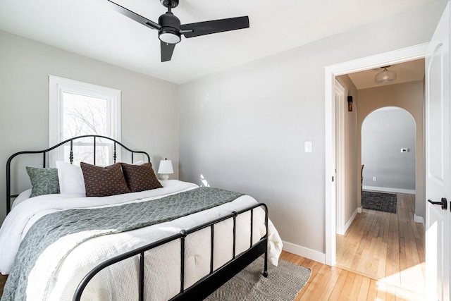 bedroom featuring ceiling fan and light wood-type flooring