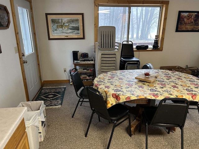 view of carpeted dining space