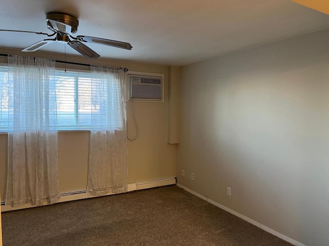 spare room featuring dark carpet, a wall unit AC, and ceiling fan