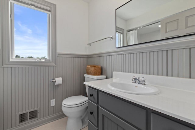 N84W36411 Riverwood Ln, Oconomowoc, WI 53066 - bathroom featuring toilet, walk in shower, tile patterned floors, and vanity