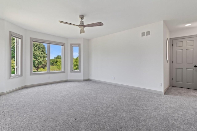 N84W36411 Riverwood Ln, Oconomowoc, WI 53066 - empty room featuring ceiling fan and light carpet