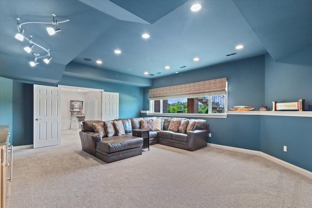 N84W36411 Riverwood Ln, Oconomowoc, WI 53066 - living room with light colored carpet and vaulted ceiling