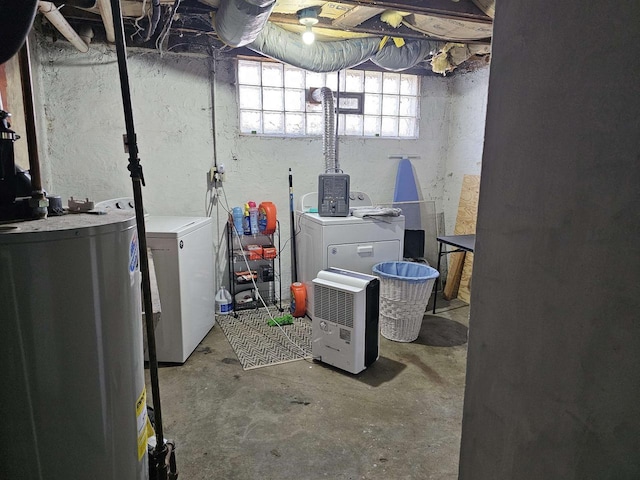 basement with washing machine and clothes dryer