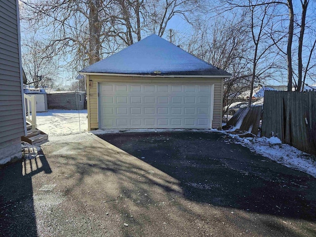 detached garage with fence