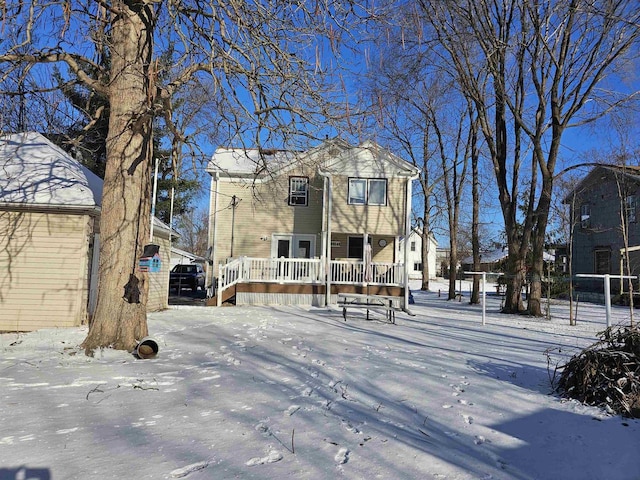 view of front of home with a wooden deck