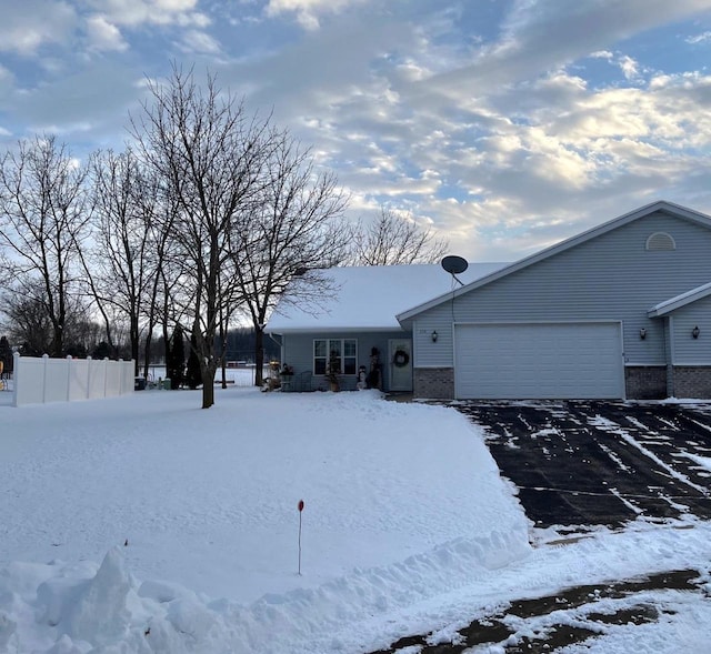 single story home featuring a garage