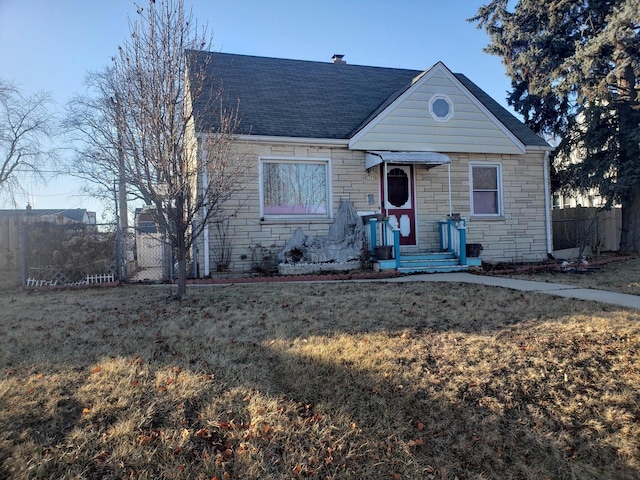 view of front of house with a front yard