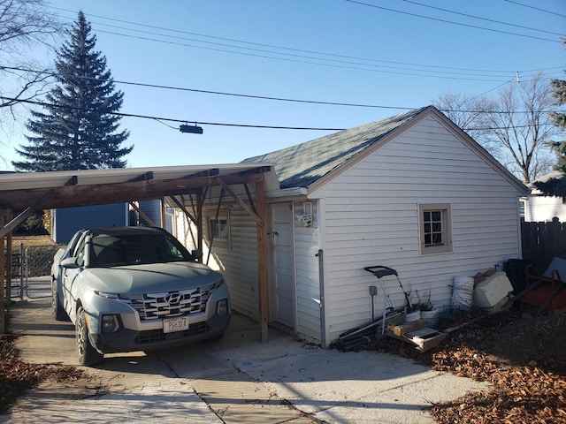 view of home's exterior featuring a carport