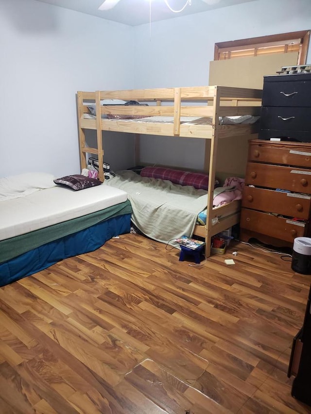 bedroom featuring hardwood / wood-style flooring