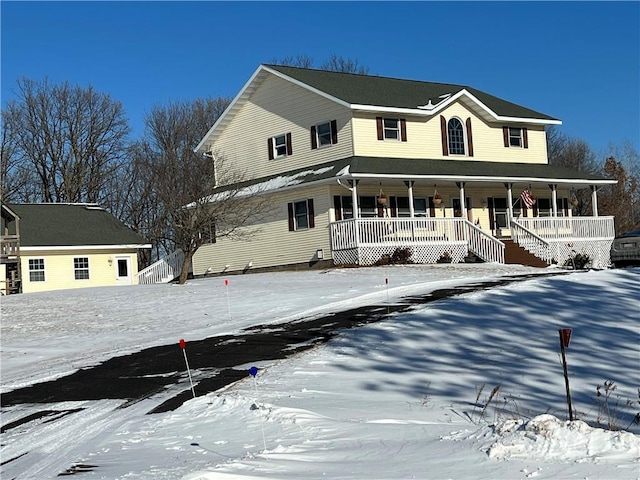 country-style home with covered porch