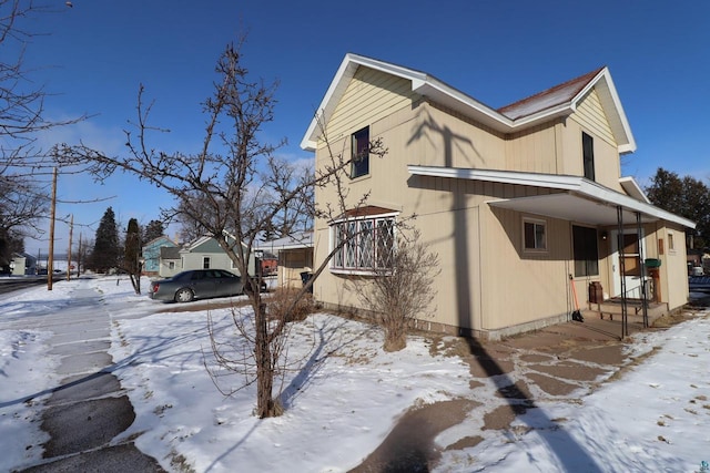 view of snow covered property