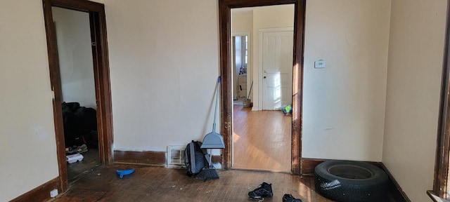 corridor featuring hardwood / wood-style flooring