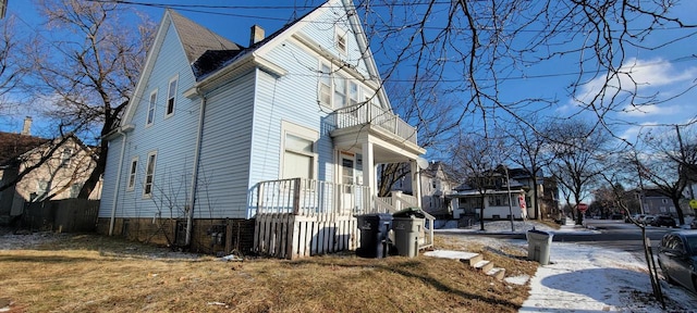 view of property exterior featuring a balcony