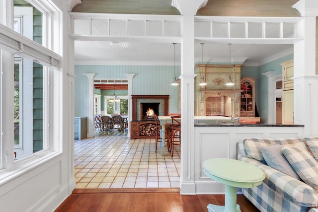 interior space with crown molding and hardwood / wood-style floors