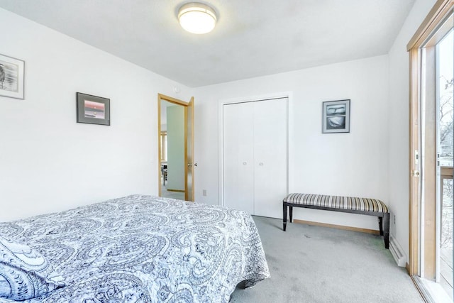 carpeted bedroom with a closet