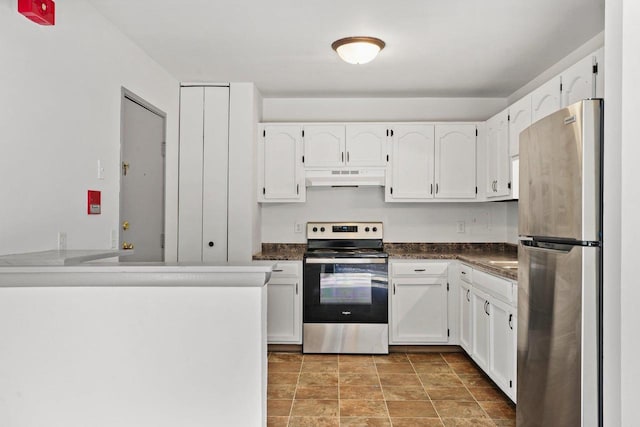 kitchen featuring kitchen peninsula, white cabinetry, and stainless steel appliances