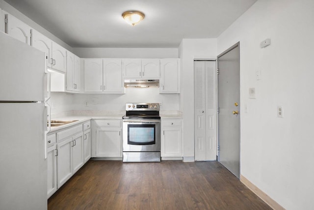 kitchen with dark wood-type flooring, white cabinetry, white refrigerator, and stainless steel range with electric cooktop