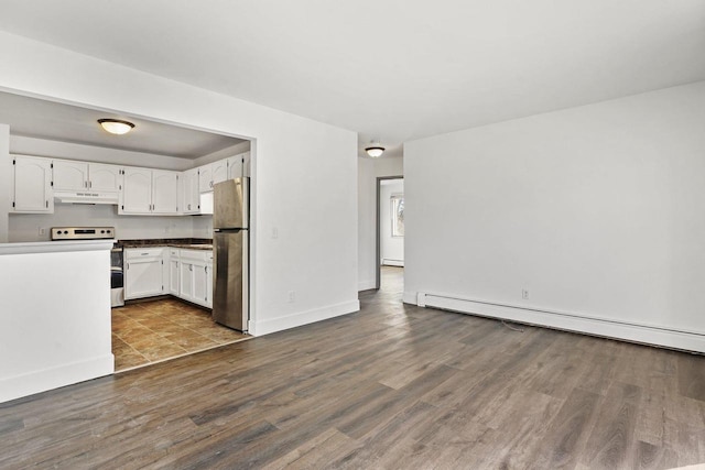 kitchen with stainless steel appliances, dark hardwood / wood-style flooring, white cabinets, and a baseboard radiator