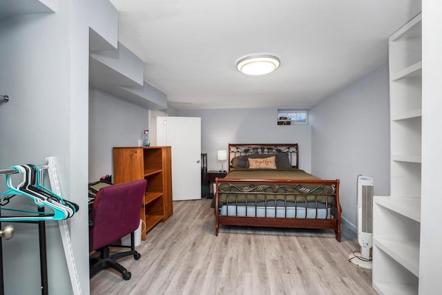 bedroom with light hardwood / wood-style floors