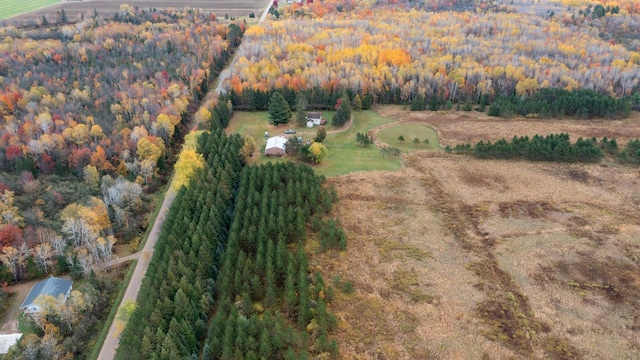 birds eye view of property with a rural view