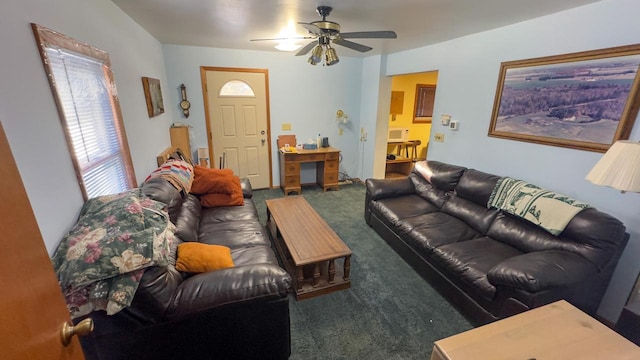 carpeted living room featuring ceiling fan