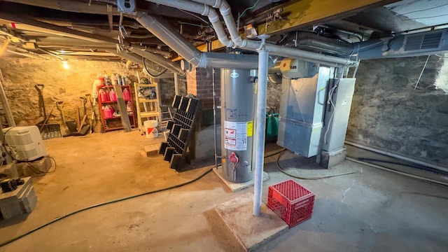 basement with heating unit and water heater