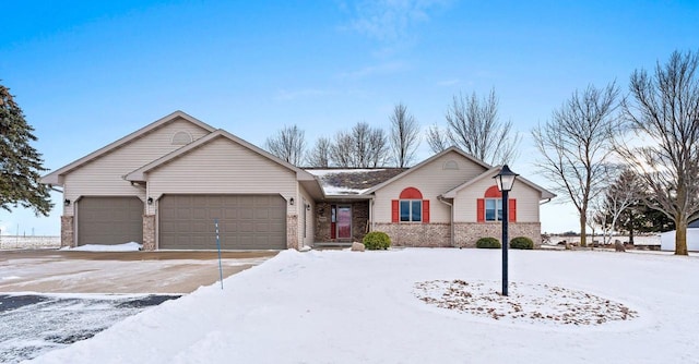 ranch-style home with a garage