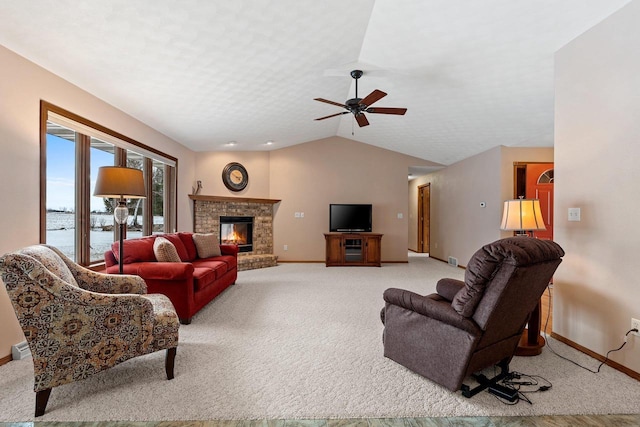 living room featuring a fireplace, light colored carpet, a water view, and vaulted ceiling