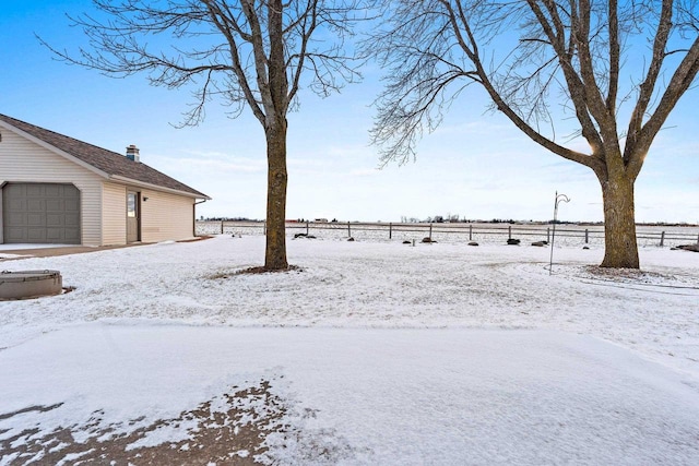 view of yard covered in snow