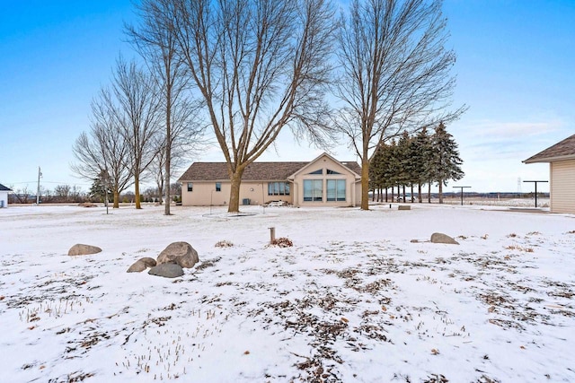 view of yard covered in snow