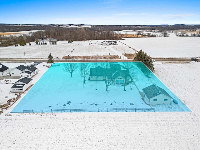 view of snow covered pool