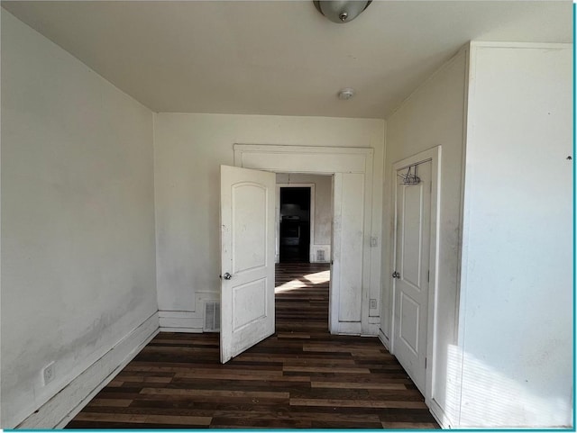 interior space featuring dark wood-type flooring