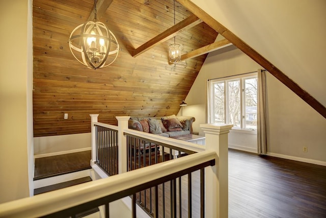 interior space with an inviting chandelier, hardwood / wood-style floors, wood ceiling, and vaulted ceiling with beams