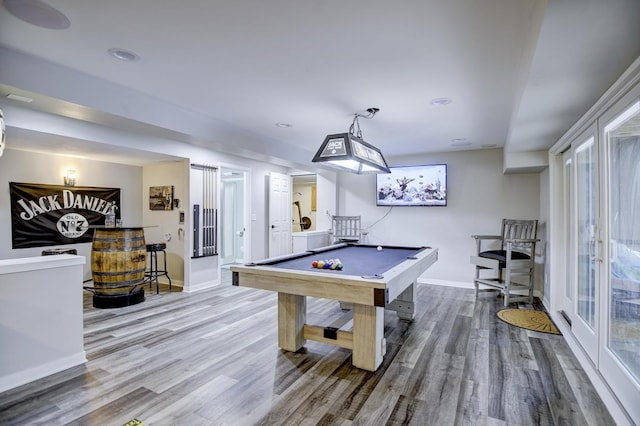 game room featuring pool table and hardwood / wood-style flooring