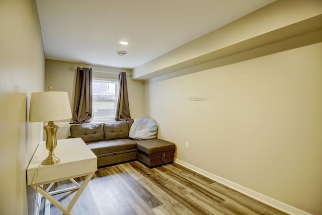 sitting room featuring hardwood / wood-style flooring