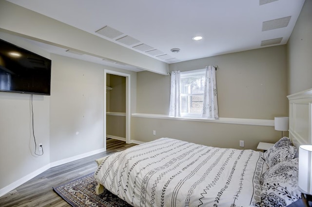 bedroom featuring hardwood / wood-style flooring