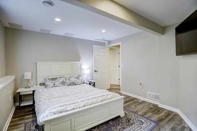 bedroom featuring dark wood-type flooring