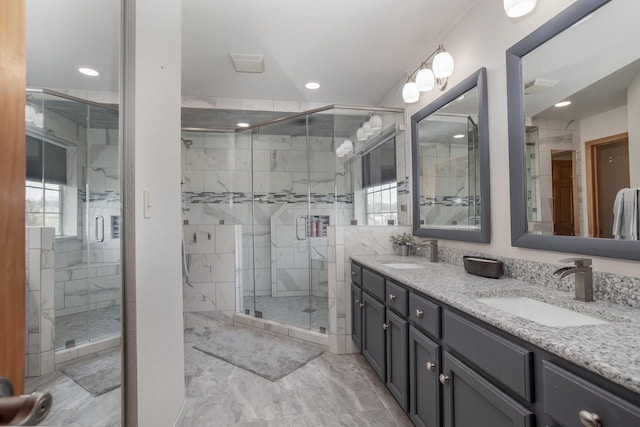 bathroom featuring vanity and walk in shower