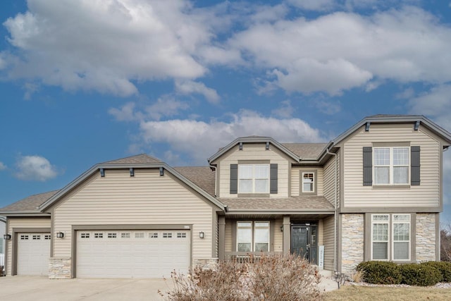 view of front of home with a garage