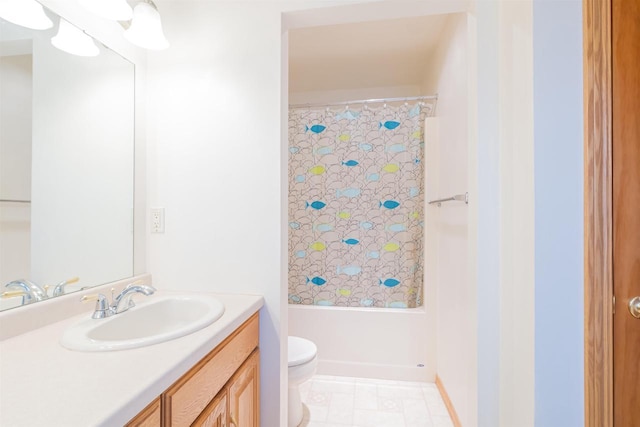 bathroom with toilet, vanity, and a shower with curtain