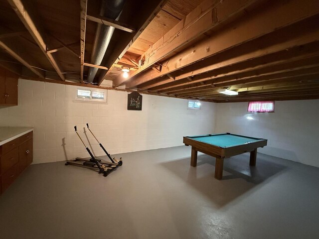 playroom with billiards and concrete flooring