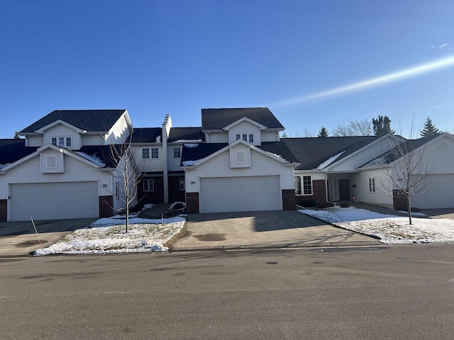 front of property with a garage