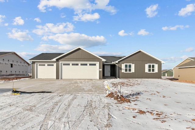 view of front of property with a garage