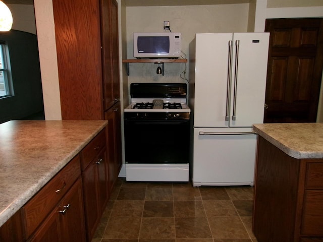 kitchen featuring white appliances